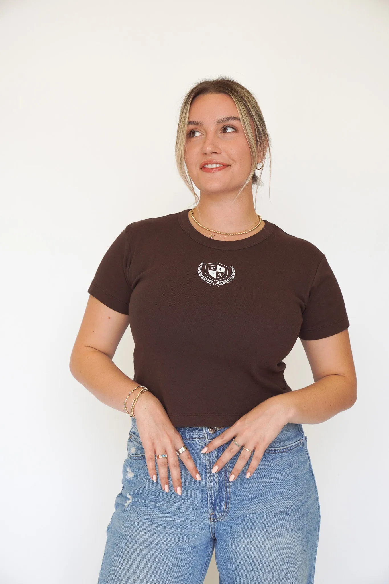 Unfinished Crest Baby Tee